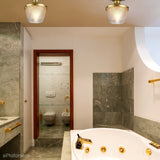 Стельовий світильник Dublin для ванної кімнати IP44 кольору латуні - Quoizel